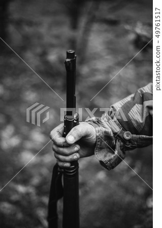 Re-enactor Dressed As World War II German Wehrmacht Soldier Holds Rifle. Photo In Black And White 49761517