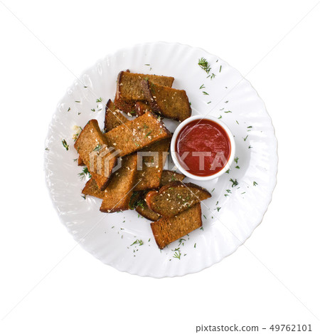 Toast rye bread and tomato sauce on the plate, isolated on white background. Top view Toast rye bread and tomato sauce on the plate, isolated on white background. Top view 49762101