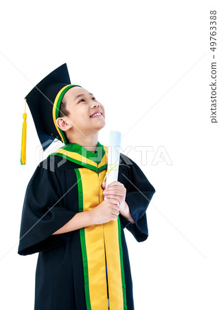 Asian child in graduation gown smiling and diploma Asian child in graduation gown smiling and diploma 49763388