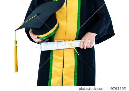 Child in graduation gown holding diploma Child in graduation gown holding diploma 49763395