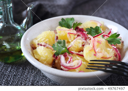 Rustic potato salad with red onions and olive oil Rustic potato salad with red onions and olive oil 49767497