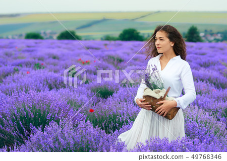 young woman is in the lavender flower field, 49768346
