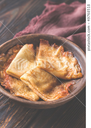 Crepes Suzette on the plate Crepes Suzette on the plate 49768518