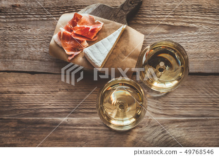 Two glasses of white wine 49768546