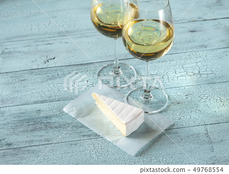 Two glasses of white wine 49768554