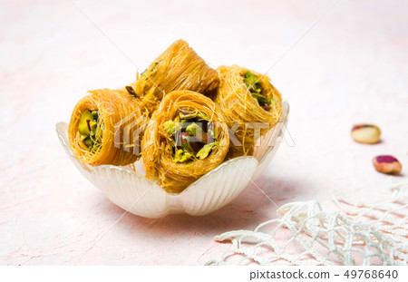 Mabrouma, an Arabic dessert with pistachio 49768640