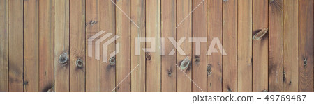 Close up of brown wooden fence panels. Many 49769487