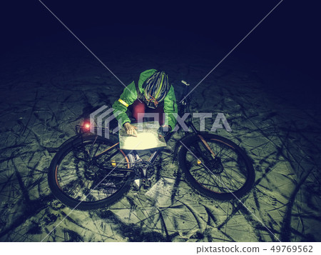 MTB race on large tire wheels in fresh snow 49769562
