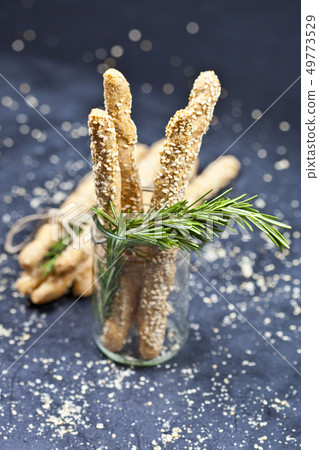Italian grissini or salted bread sticks with 49773529