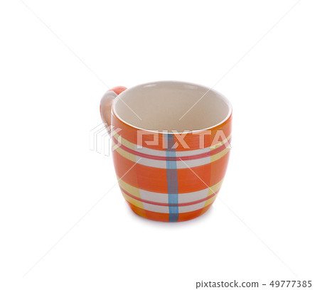 Orange ceramic mug. Isolated on a white background Orange ceramic mug. Isolated on a white background 49777385
