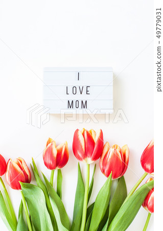 Mothers Day greeting card with red tulip flowers Mothers Day greeting card with red tulip flowers 49779031