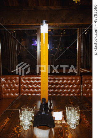 beer tower on the table 49783660