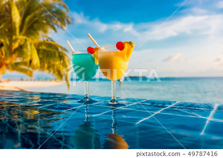 Cocktail near the swimming pool Cocktail near the swimming pool 49787416