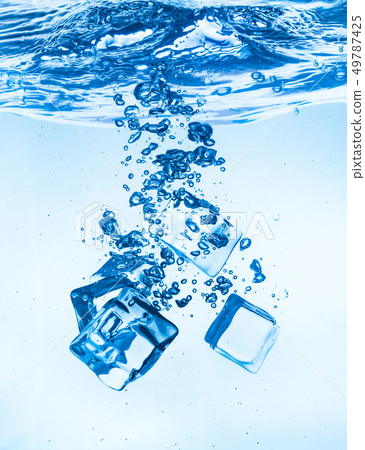 Ice cubes falling under water Ice cubes falling under water 49787425
