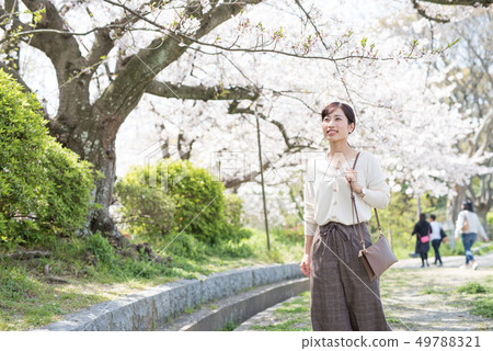 Woman enjoying spring Woman enjoying spring 49788321