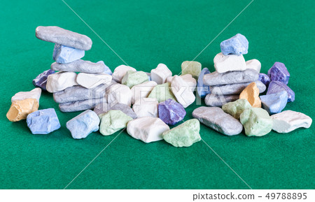 stacks and pile of various multicolored stones stacks and pile of various multicolored stones 49788895