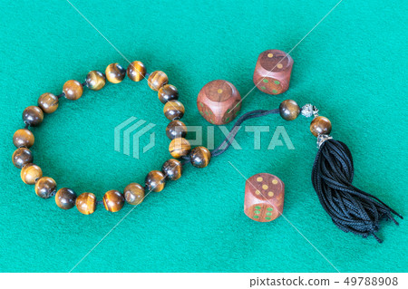 worry beads and three dices with various points 49788908