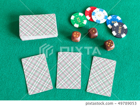 card decks, casino tokens and dices on table card decks, casino tokens and dices on table 49789053
