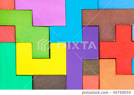 background from assembled puzzle from wood blocks 49789059