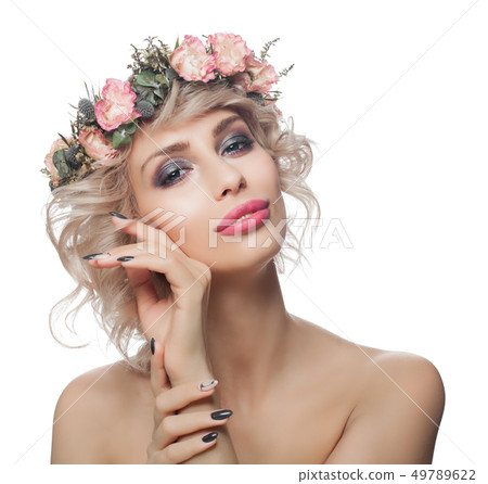 Attractive woman with makeup, blonde curly hair Attractive woman with makeup, blonde curly hair 49789622