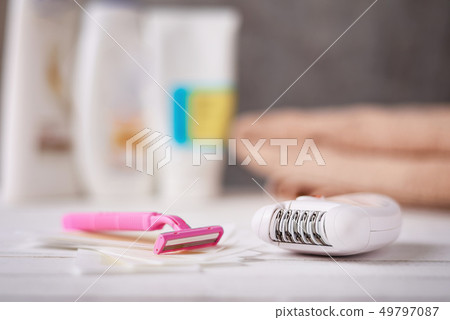 Epilator, shaving razor and wax strips 49797087