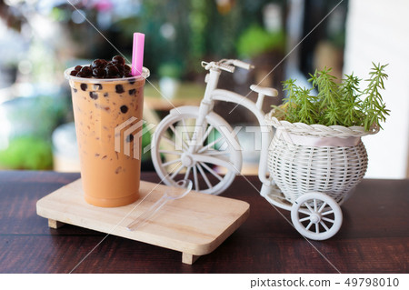 Ice bubble milk tea in takeaway glass. Ice bubble milk tea in takeaway glass. 49798010