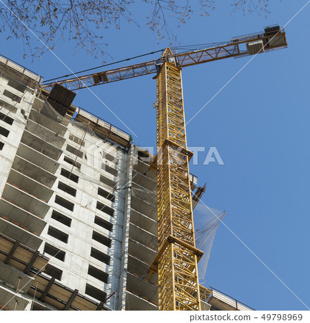 Crane works in building construction Crane works in building construction 49798969