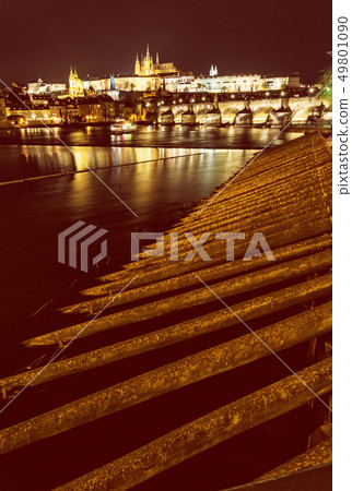 Prague castle and Charles bridge mirroring in Prague castle and Charles bridge mirroring in 49801090