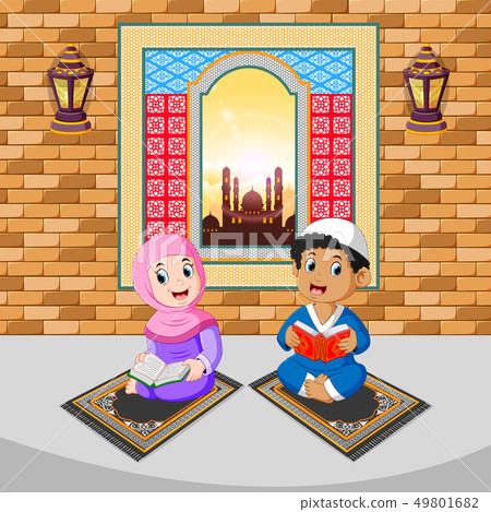 the two children are reading and praying  49801682