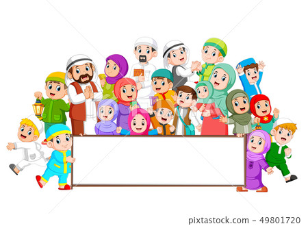 A muslim family are gathering near the blank board 49801720