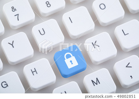 Computer keyboard with blue lock button 49802851