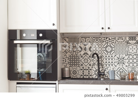 Modern kitchen interior with built-in appliances 49803299