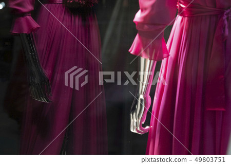 Silver woman mannequin hand detail with pink dress 49803751