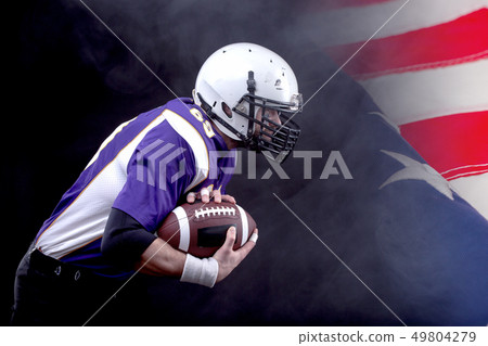 American Footballer running fast 49804279