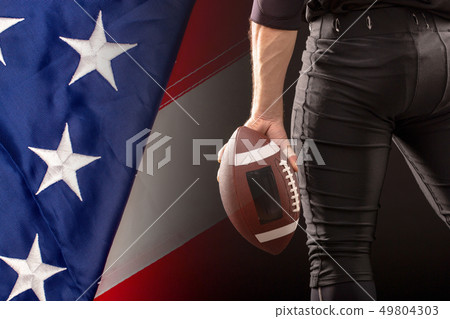 Cropped Image Of Sportsman Holding American Football Ball Cropped Image Of Sportsman Holding American Football Ball 49804303