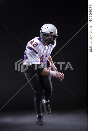 American Footballer running fast American Footballer running fast 49804626
