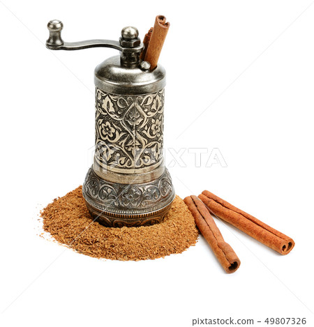 Rolled bark and cinnamon powder and hand mill 49807326