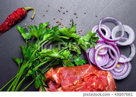 Raw meat and vegetable ingredients 49807661