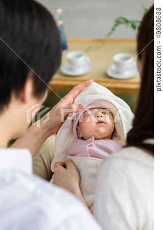 Baby and her husband and wife Baby and her husband and wife 49808688