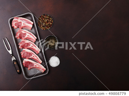 Fresh raw butchers lamb beef cutlets in plastic Fresh raw butchers lamb beef cutlets in plastic 49808779