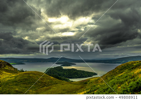 Calm Water And Green Meadows At Loch Lomond In Sco Calm Water And Green Meadows At Loch Lomond In Sco 49808911
