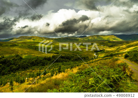 Scenic Landscape With Green Valley And Cloudy Sky Scenic Landscape With Green Valley And Cloudy Sky 49808912