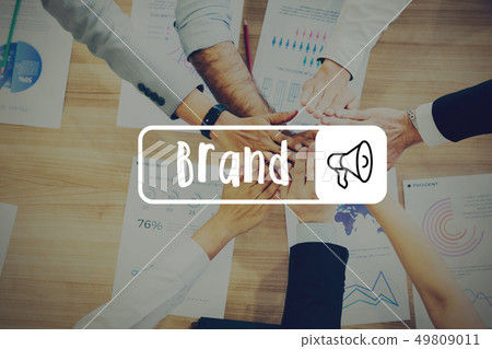 Group of business people with hands together on desk - Brand 49809011