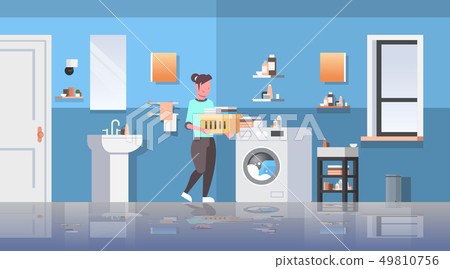 woman with basket of clothes standing near washing machine housewife doing housework modern bathroom woman with basket of clothes standing near washing machine housewife doing housework modern bathroom 49810756