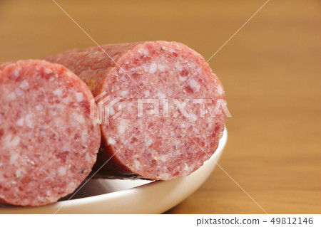 Cross section of soft salami. 49812146