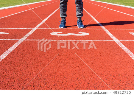 Runner feet on the starting line Runner feet on the starting line 49812730