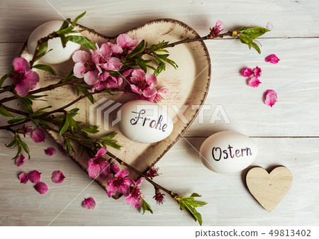 Frohe Ostern written on eggs Frohe Ostern written on eggs 49813402
