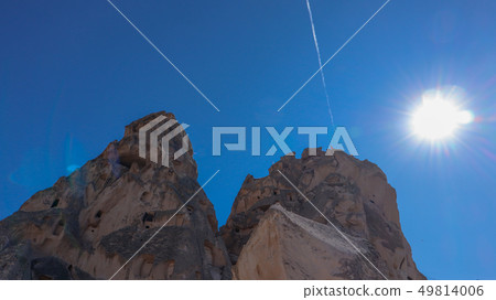 Rock castle and contrail Rock castle and contrail 49814006