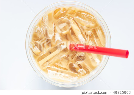 Top view of glass of iced coffee on white 49815903