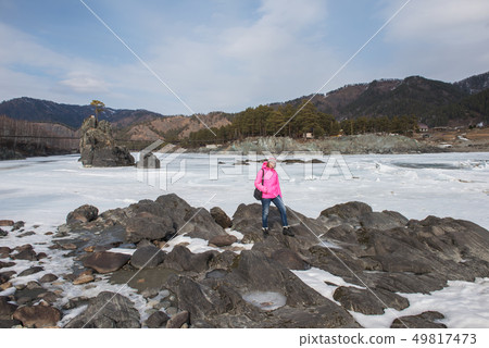 Happy woman relaxing on the top of mountain 49817473